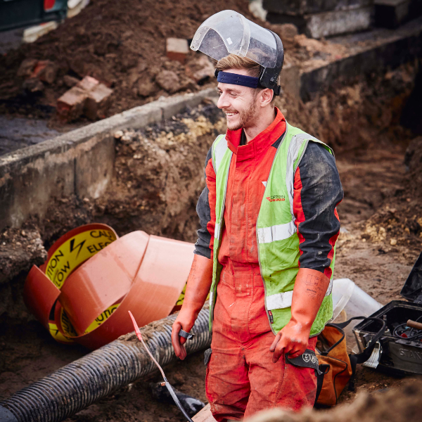 Northern Powergrid employee in a high visibility jacket working on an undergrounding project for a major new connection.