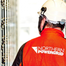 Northern Powergrid male employee - back to camera - showing a Northern Powergrid branded uniform