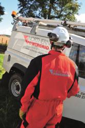Northern Powergrid engineer with his back to the picture and a white Northern Powergrid branded van. 