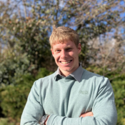 Tom Ardron in front of some trees